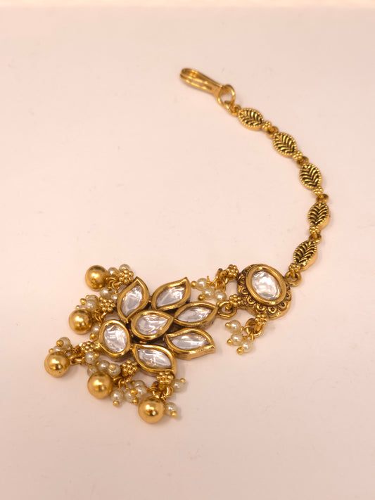 Gold Kundan Layered Necklace Set with Jhumka Earrings and Maang Tikka