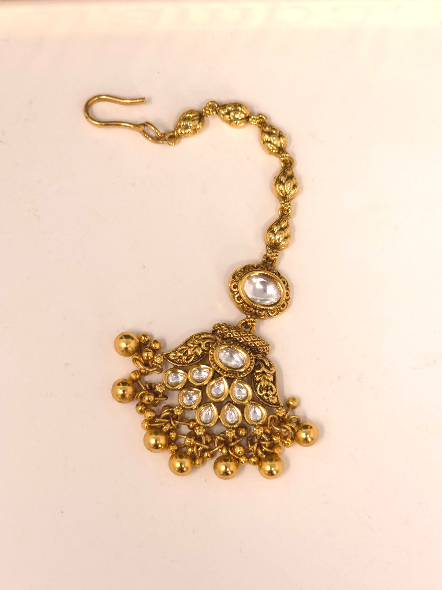 Gold Kundan Layered Necklace Set with Jhumka Earrings and Maang Tikka