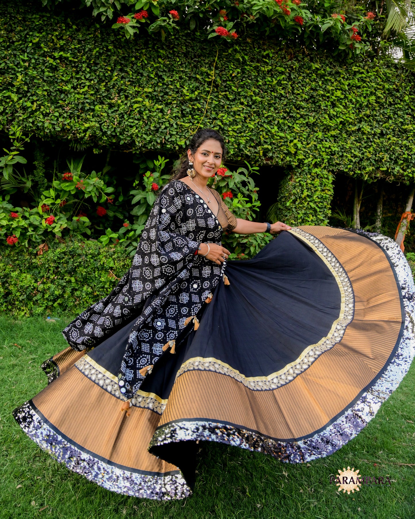 Black Chaniya Choli with Golden Border.