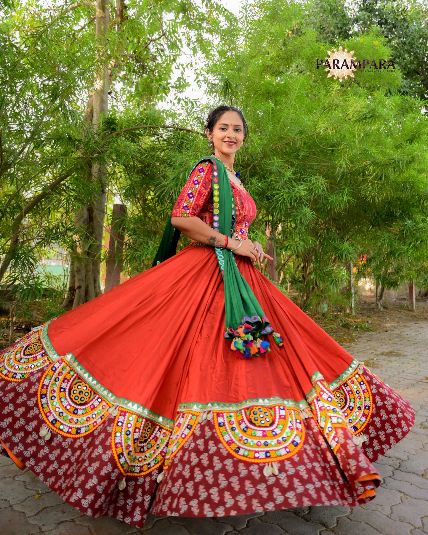 Red Color Chaniya Choli with Green Bandhani Dupatta.