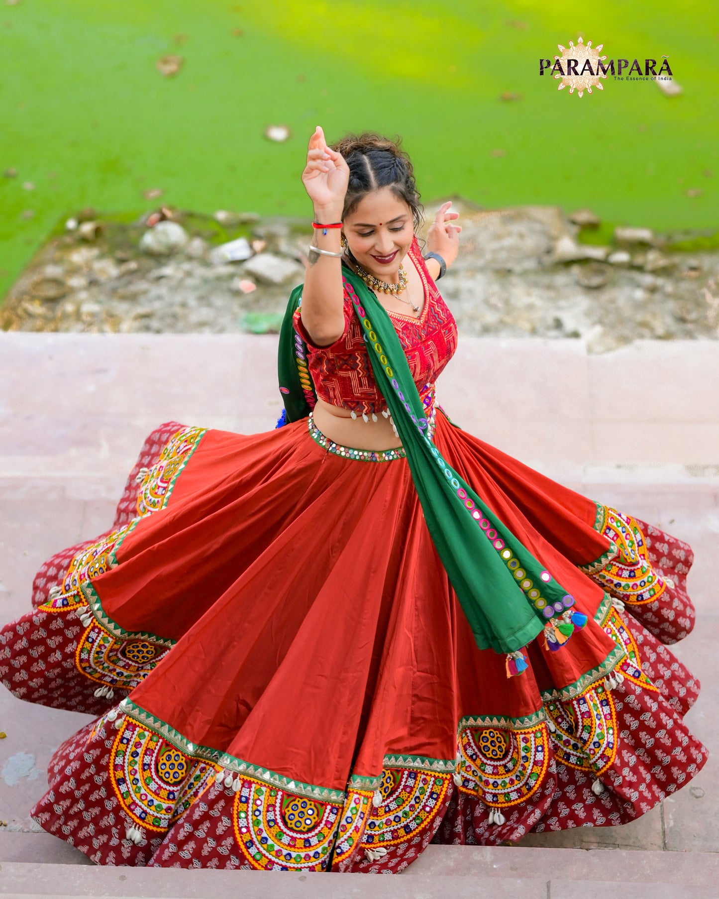 Red Color Chaniya Choli with Green Bandhani Dupatta.