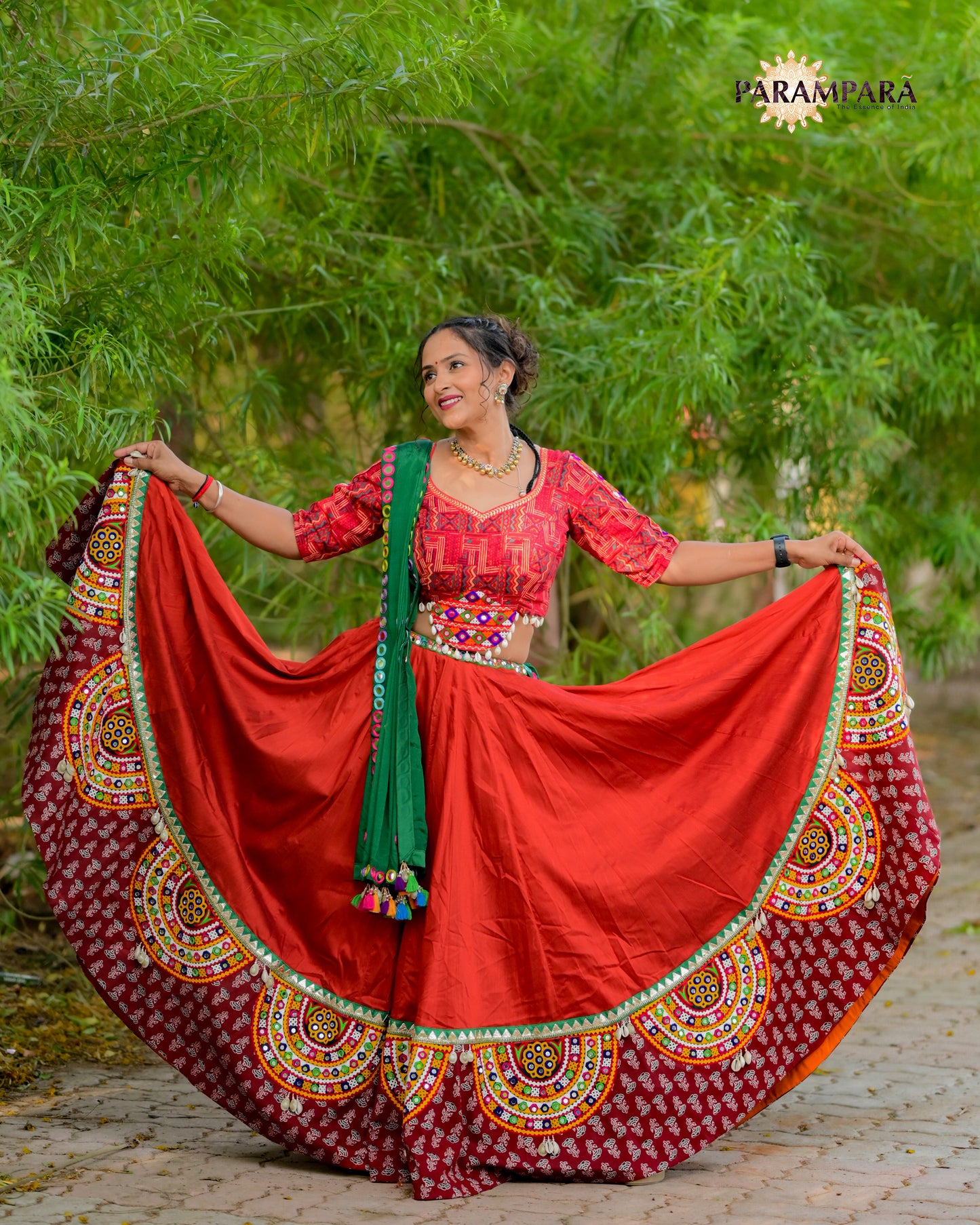 Red Color Chaniya Choli with Green Bandhani Dupatta.