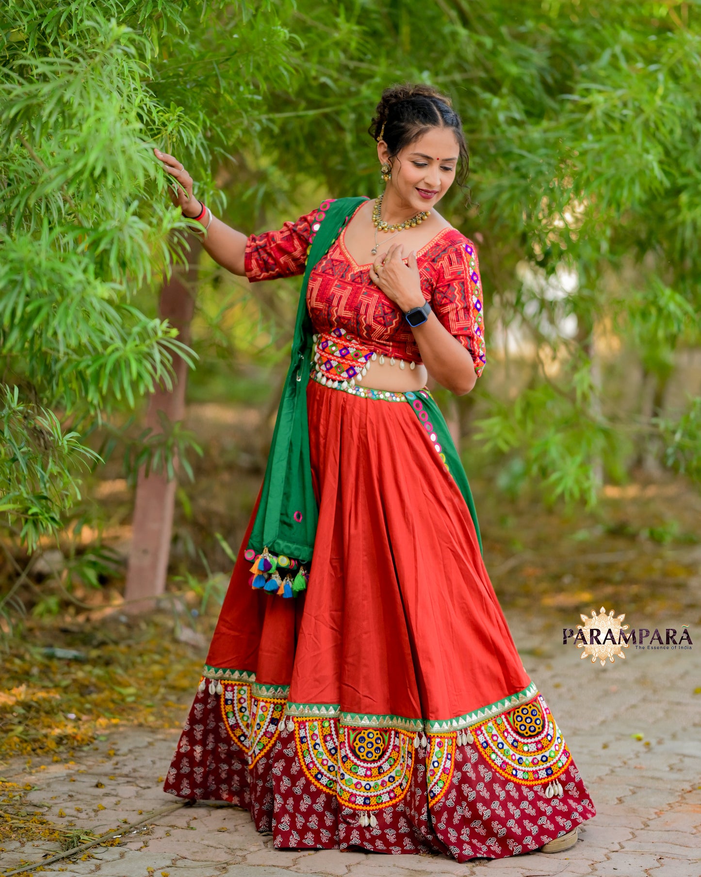 Red Color Chaniya Choli with Green Bandhani Dupatta.