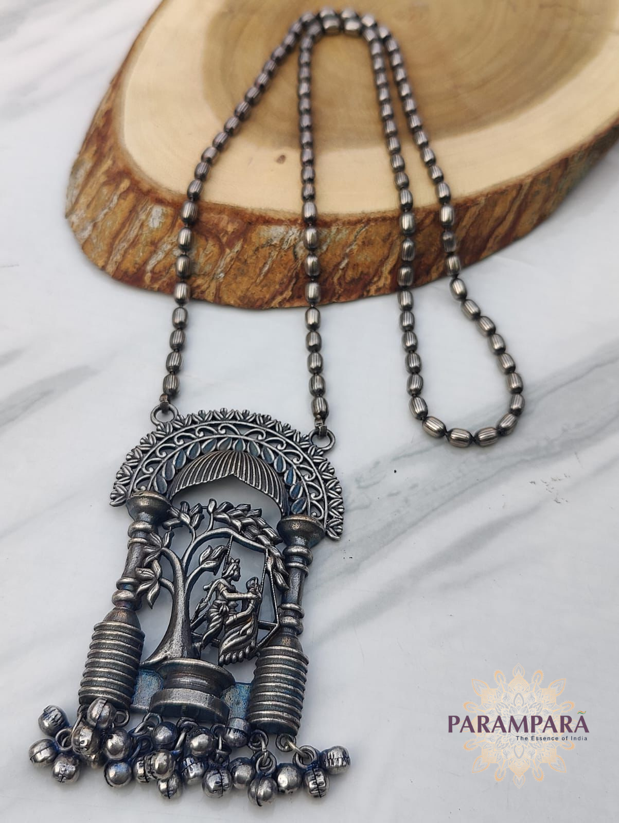 "Oxidized silver tribal pendant necklace with beaded chain and hanging bell charms – handmade ethnic jewelry"