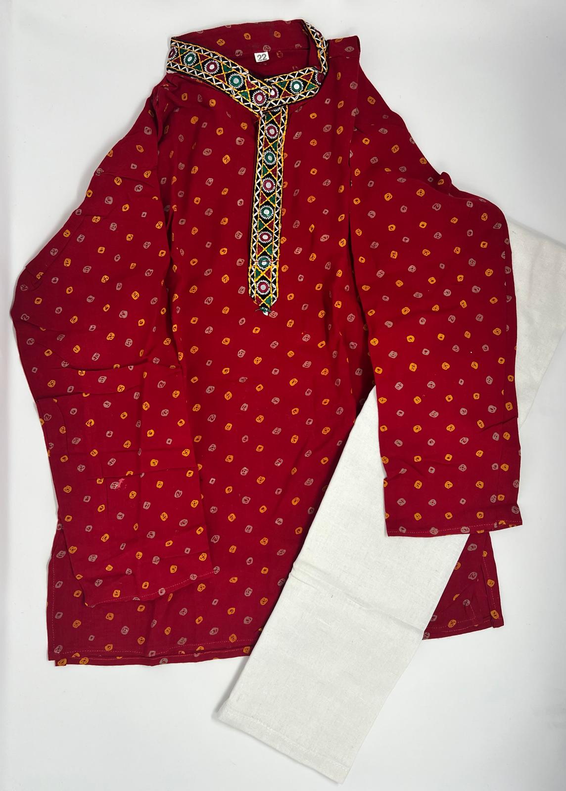 The kurta is made from a Maroon woven fabric with simple Colorful embroidery patterns.
The pajama is crafted from plain cotton.
Such attire is often worn for festivals, cultural events, or casual occasions.