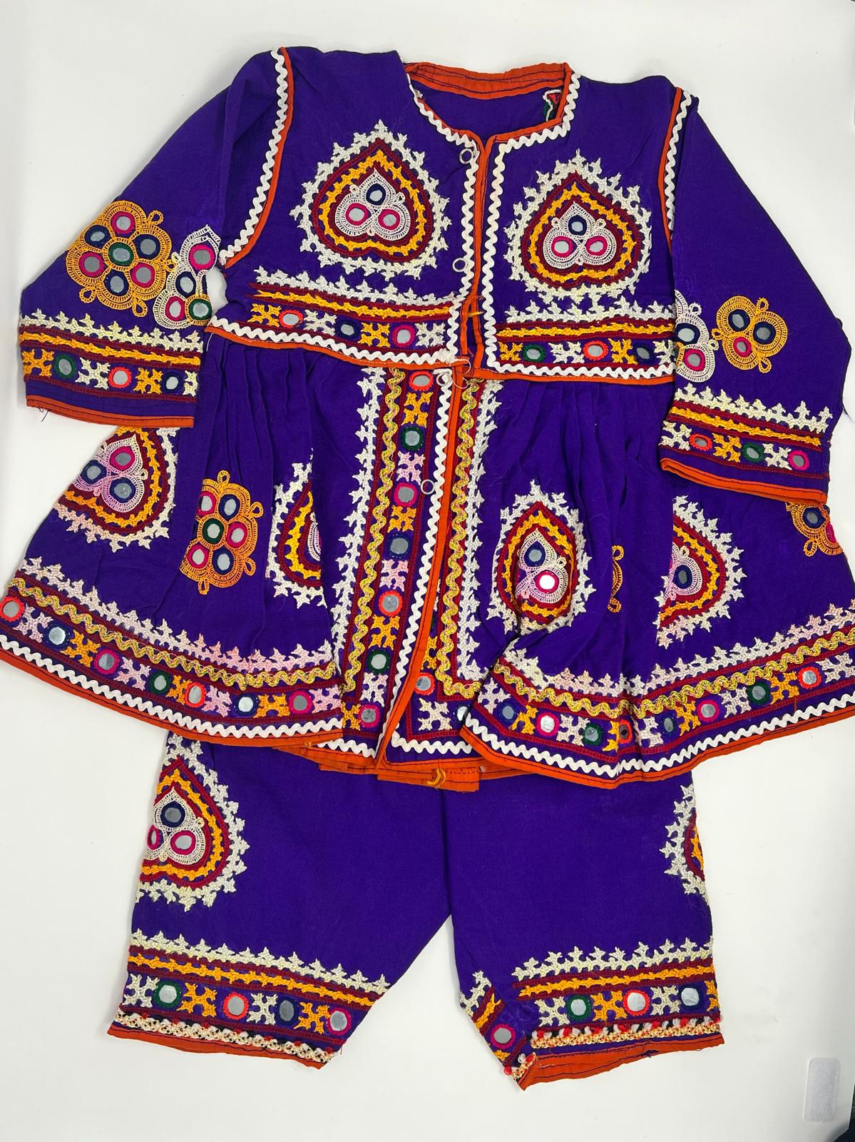 This is a traditional Blue embroidered vest featuring intricate and vibrant designs, typically associated with cultural or folkloric attire.