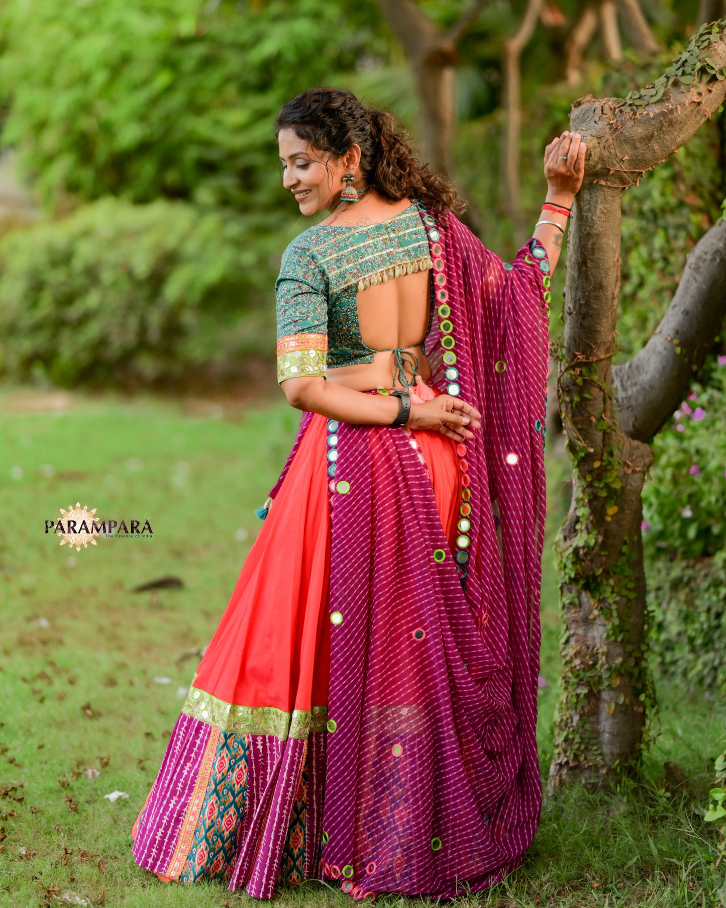 Chaniya Choli with Red chaniya and Magenta and Rama print Border.