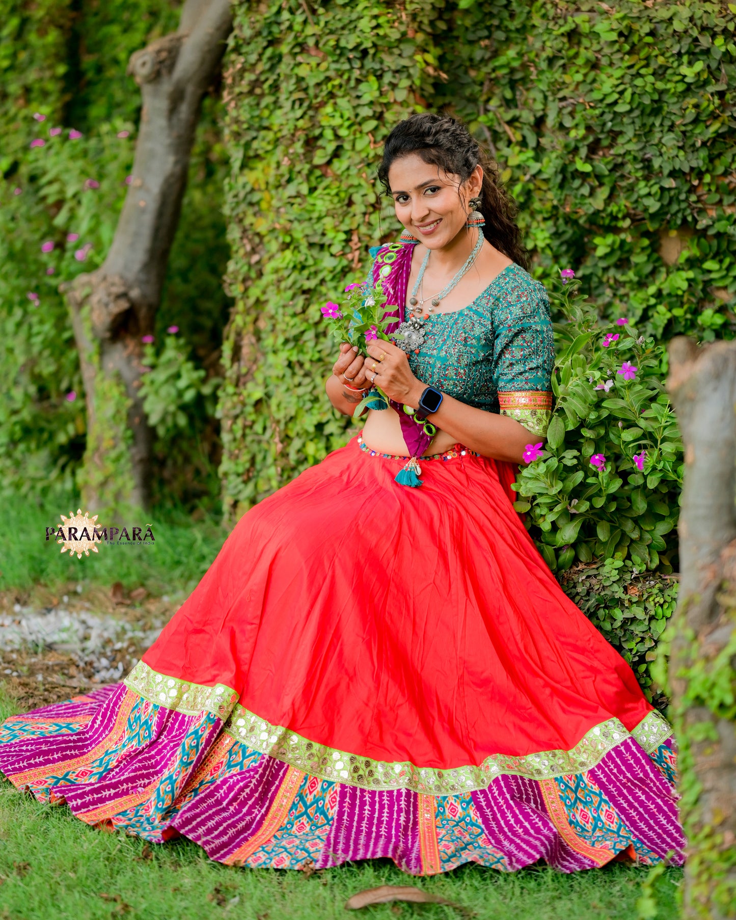 Chaniya Choli with Red chaniya and Magenta and Rama print Border.