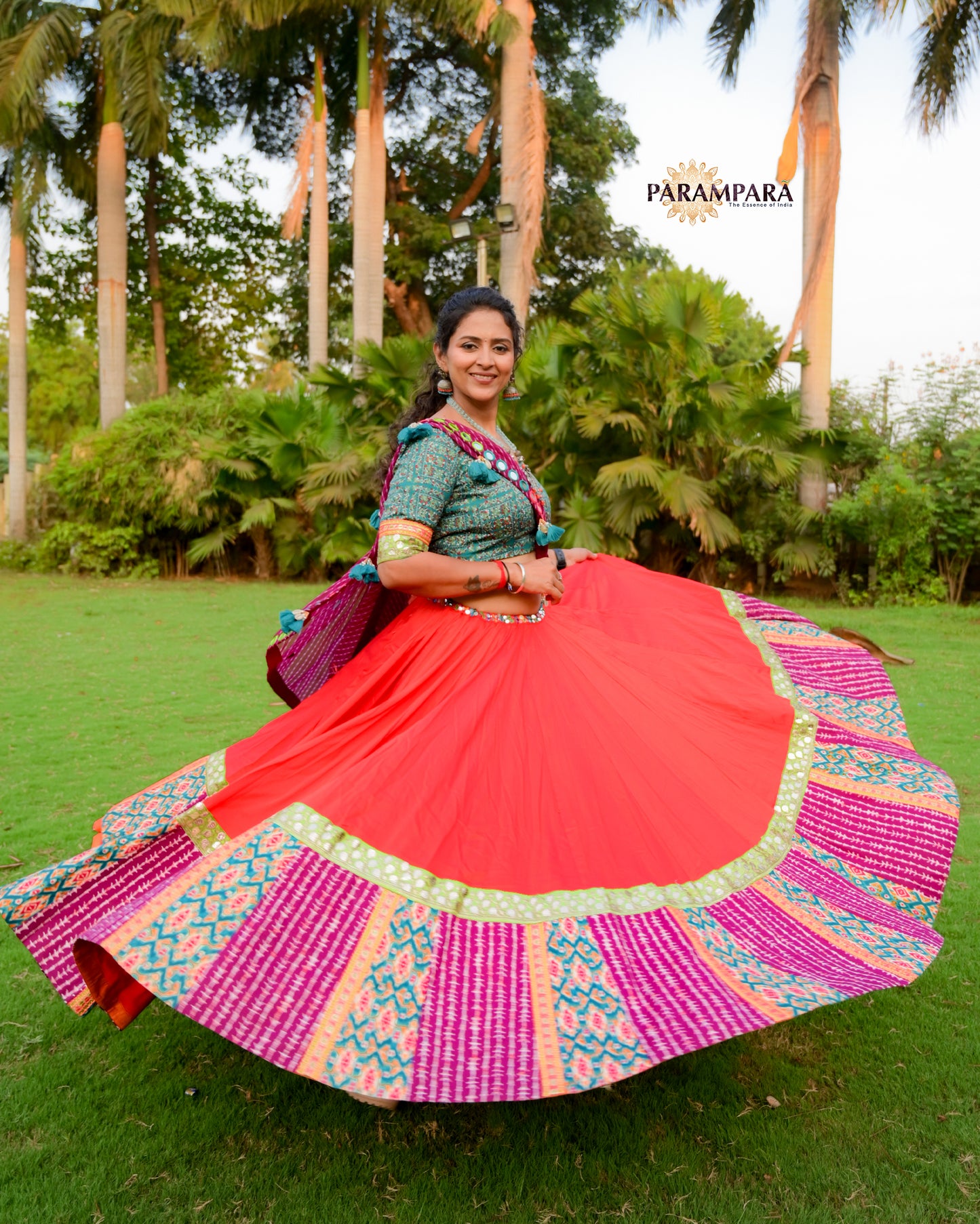 Chaniya Choli with Red chaniya and Magenta and Rama print Border.