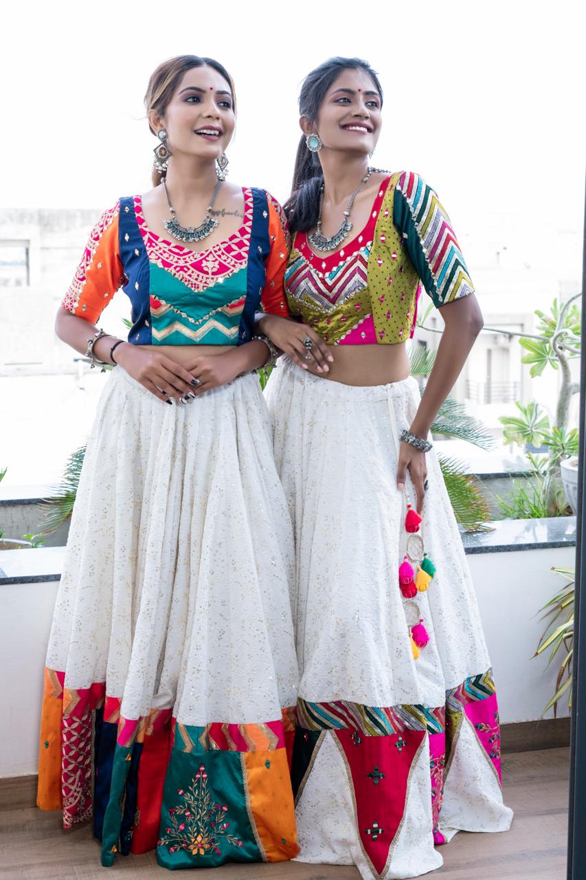White Choli with Blue Multicolor blouse.