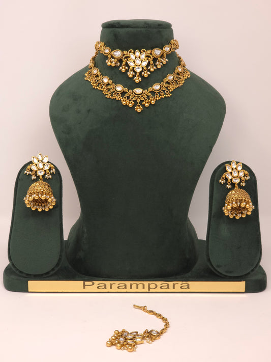 Gold Kundan Layered Necklace Set with Jhumka Earrings and Maang Tikka