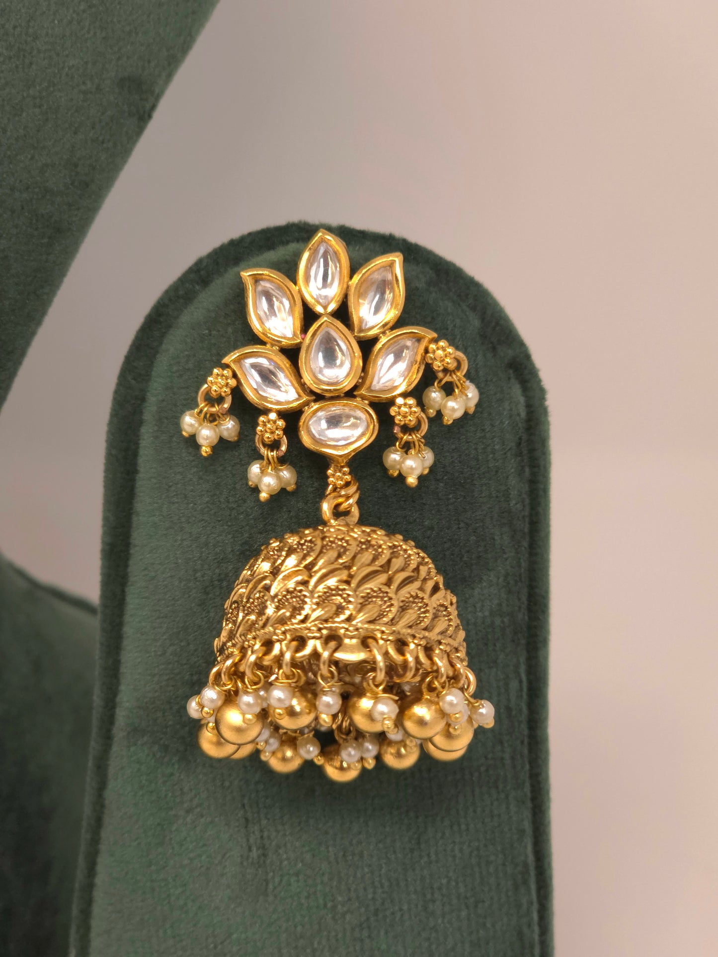 Gold Kundan Layered Necklace Set with Jhumka Earrings and Maang Tikka
