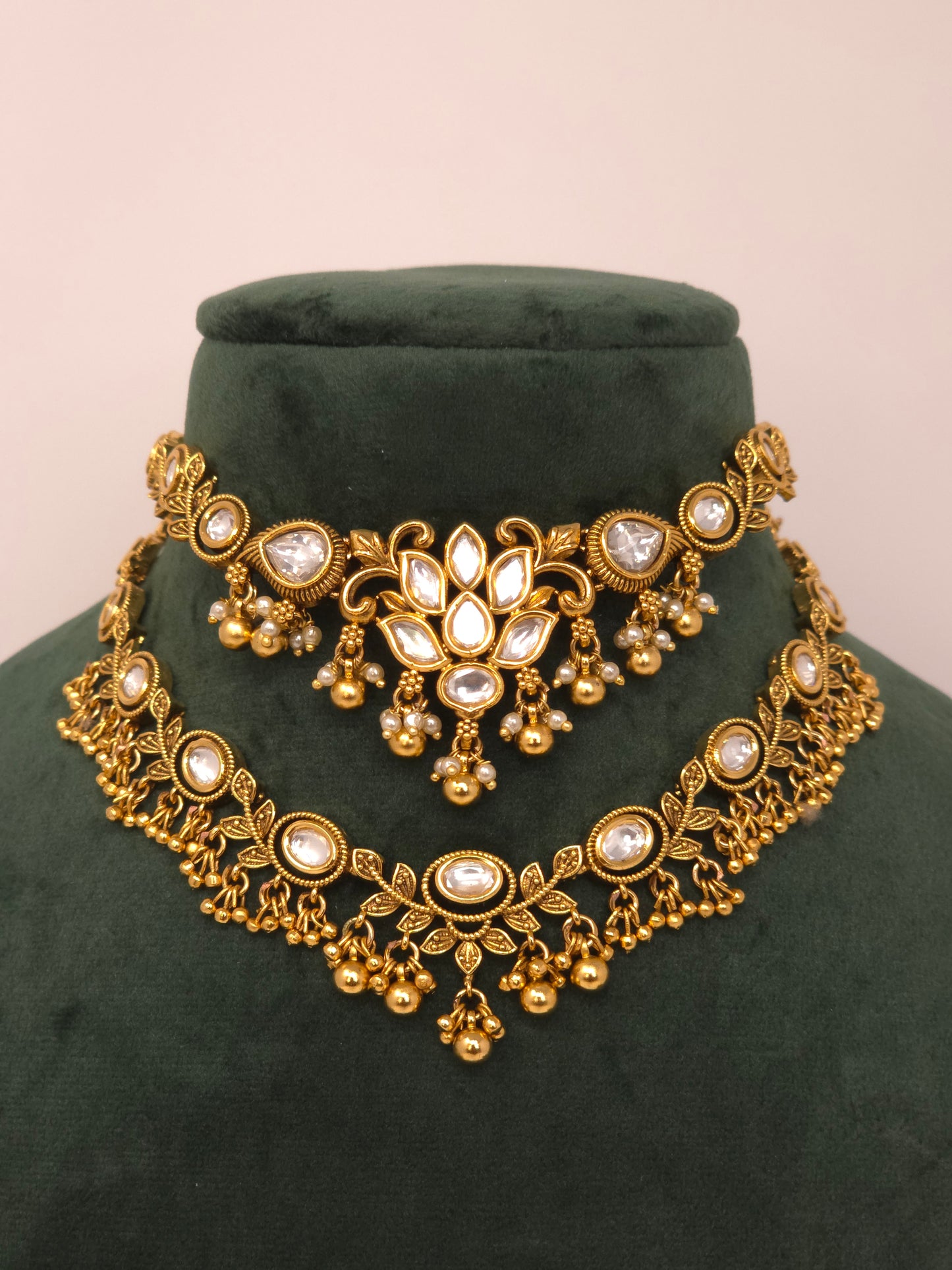 Gold Kundan Layered Necklace Set with Jhumka Earrings and Maang Tikka