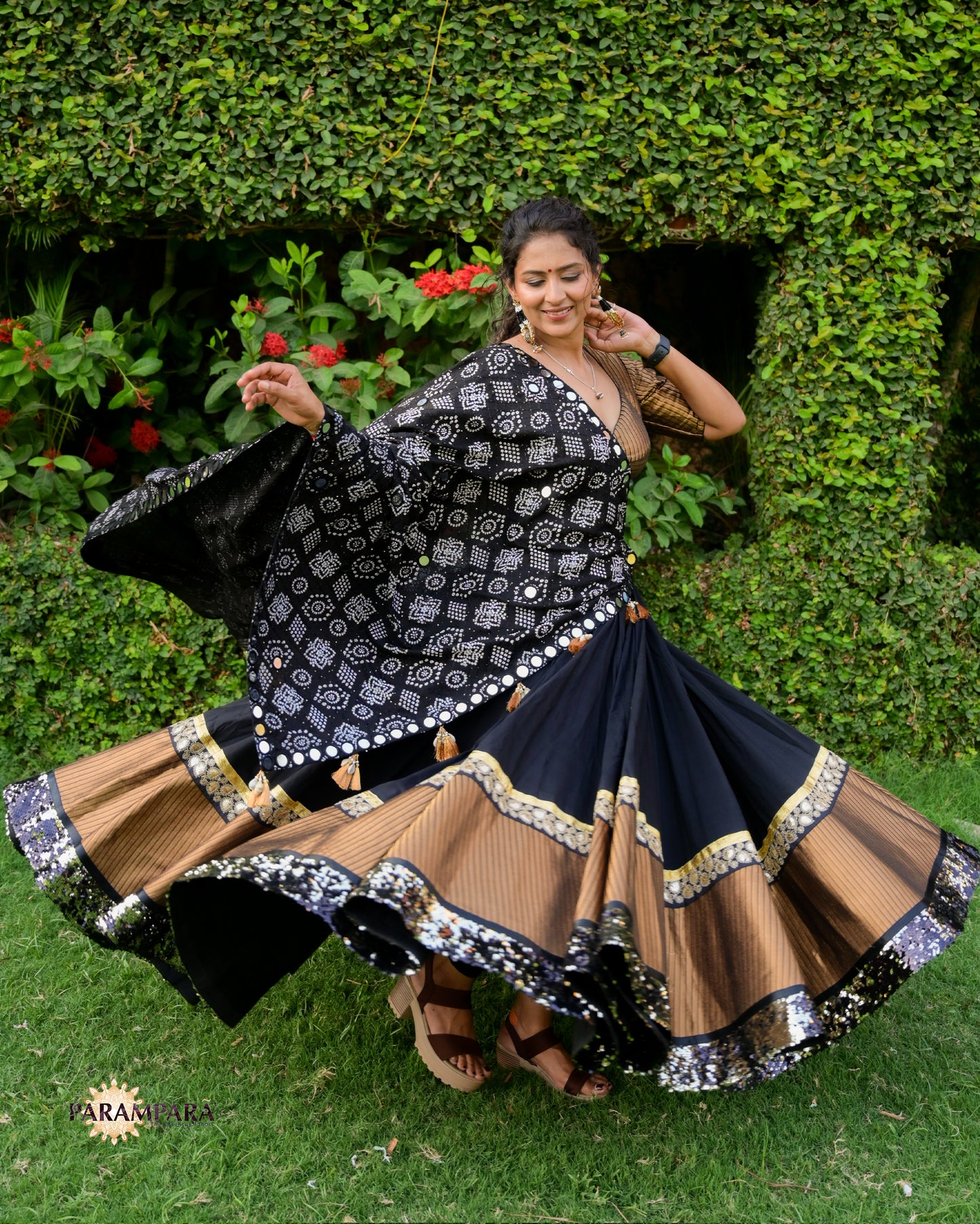 Black Chaniya Choli with Golden Border.