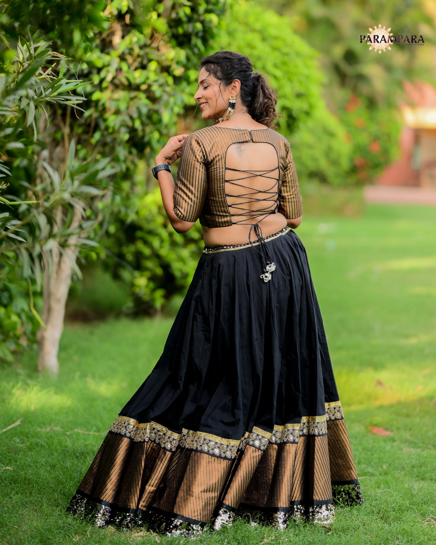 Black Chaniya Choli with Golden Border.