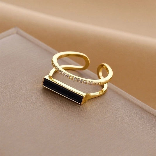 Set of anti-tarnish rings in gold and silver tones, stackable and resistant to fading or discoloration, perfect for daily wear