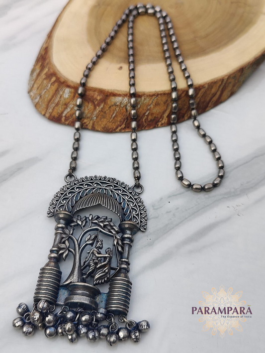 "Oxidized silver tribal pendant necklace with beaded chain and hanging bell charms – handmade ethnic jewelry"