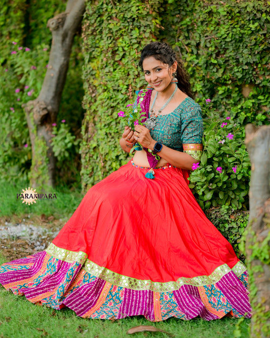 Chaniya Choli with Red chaniya and Magenta and Rama print Border.